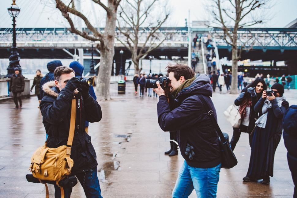 Free Image of Photographers capturing each other 