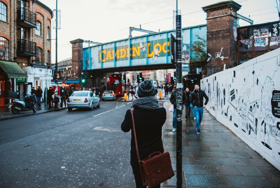 Free Image of Tourist capturing the Camden Lock sign 