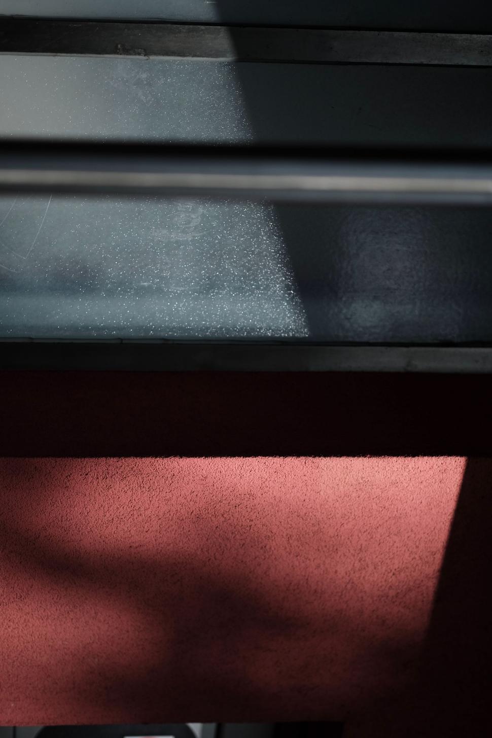 Free Image of Abstract light and shadow on textured surfaces 