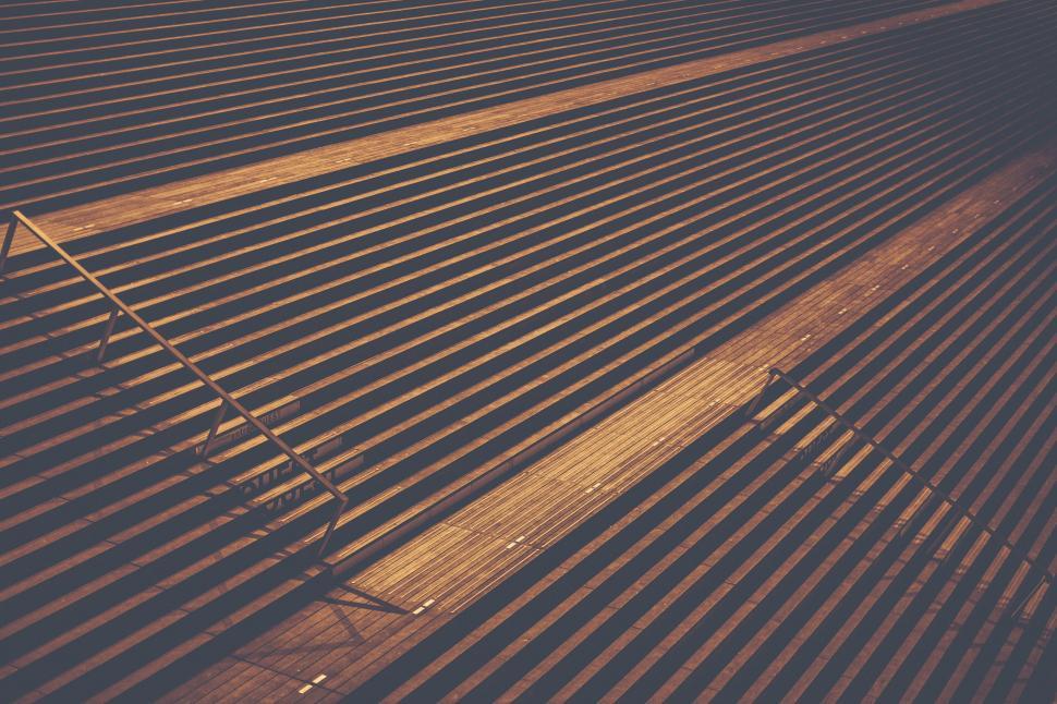 Free Image of Shadow lines on a floor with a chair 