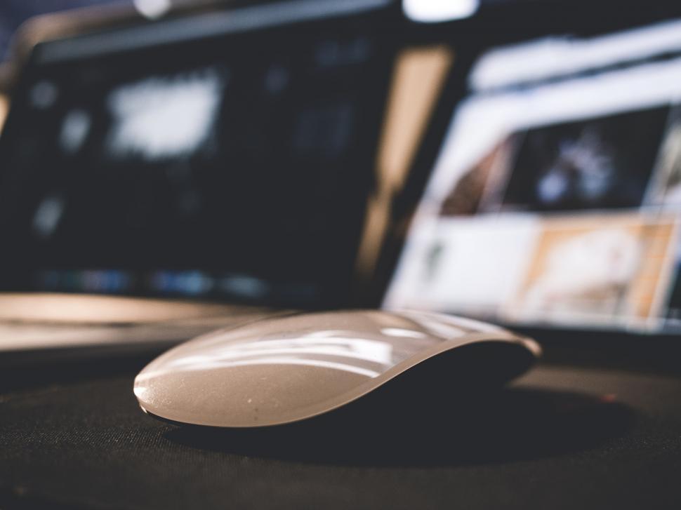 Free Image of Close-up of computer mouse on a dark surface 