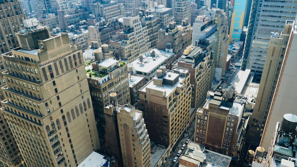 Free Image of Urban cityscape with dense buildings and streets 