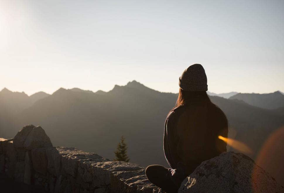 Free Image of Contemplative woman enjoying mountain view 