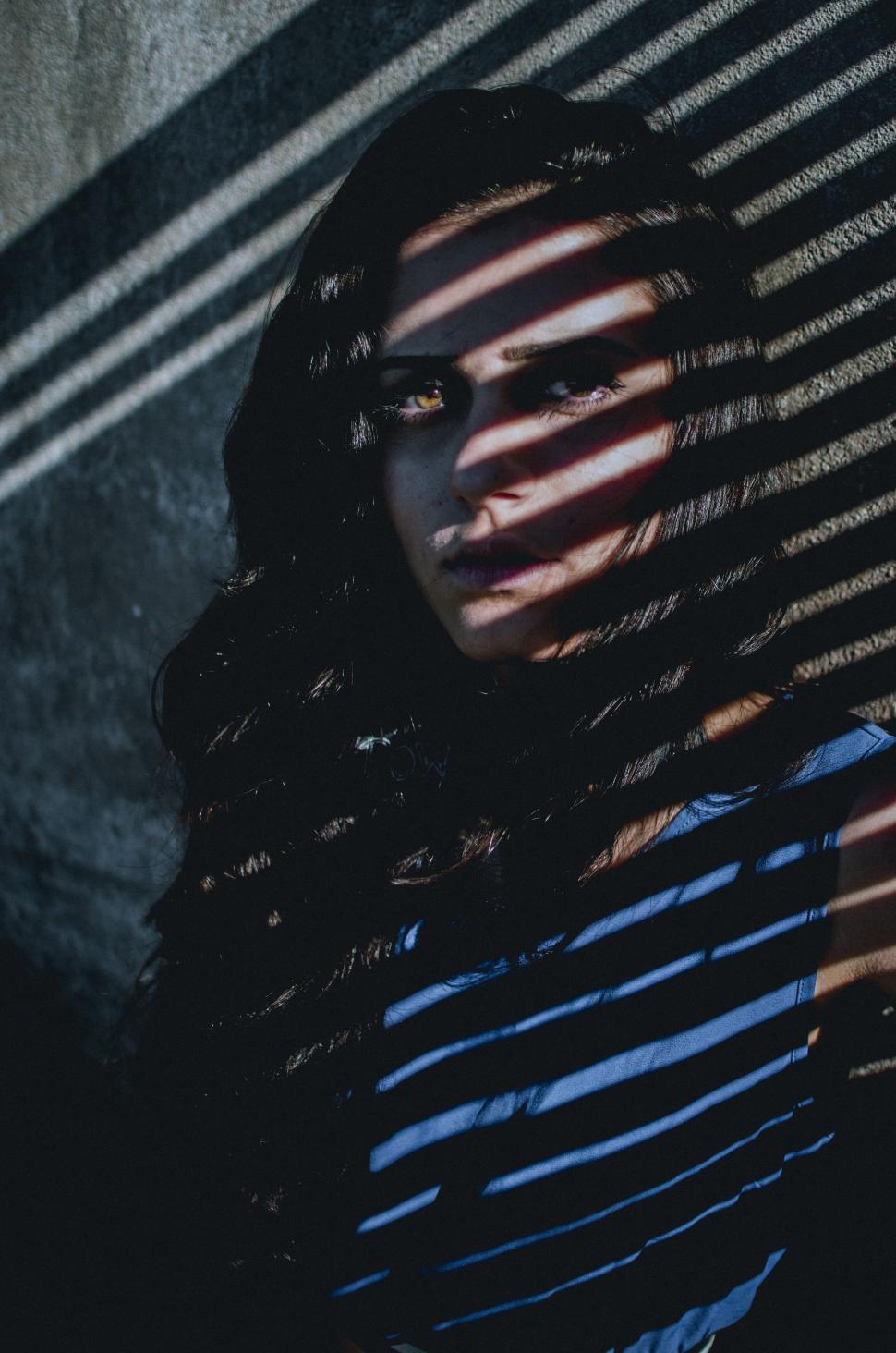 Free Image of Shadow stripe pattern on unrecognizable woman 