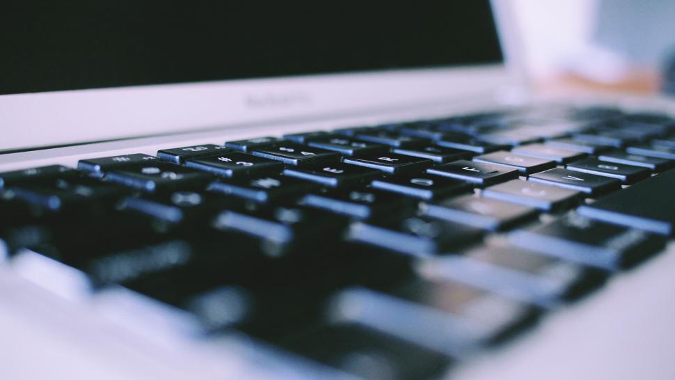 Free Image of Laptop keyboard focusing on the keys 