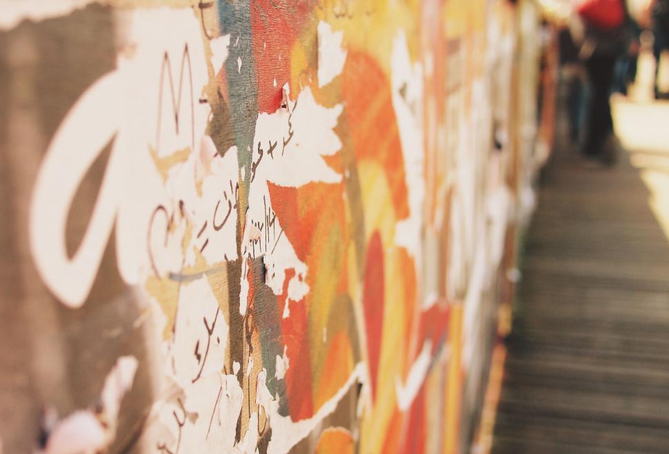 Free Image of Graffiti-covered wall with vibrant colors 