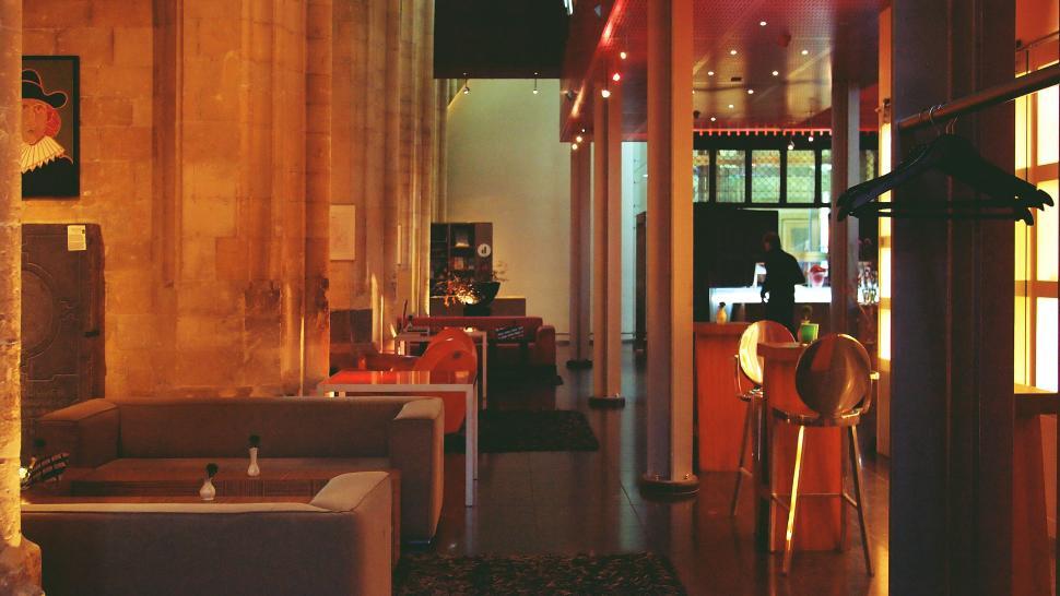 Free Image of Warm and cozy bar interior with soft lighting 