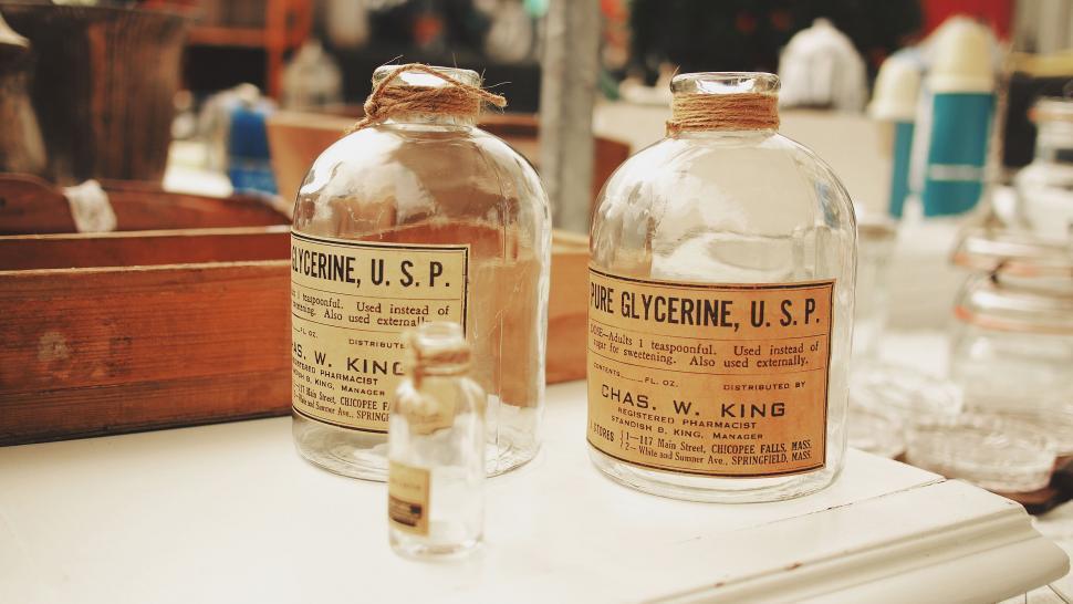 Free Image of Vintage bottles on a wooden surface 