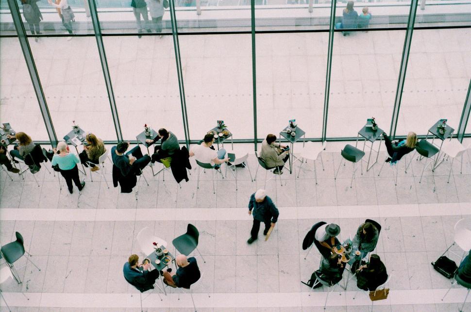 Free Image of Overhead view of busy coffee shop scene 