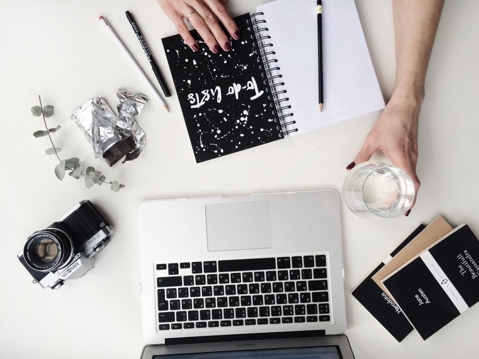 Free Image of Workspace with laptop and notebook 