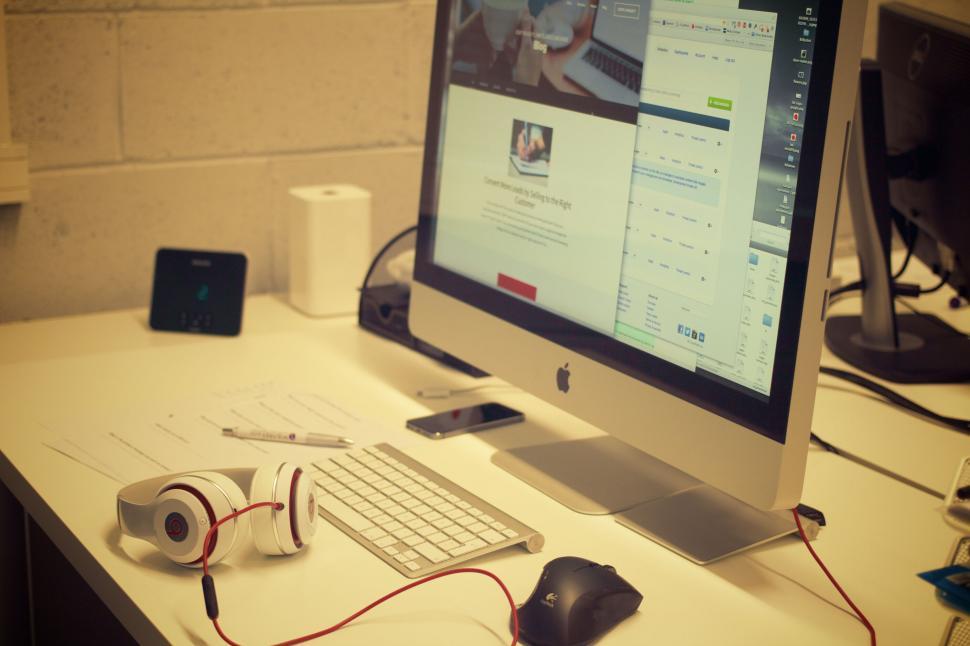 Free Image of Modern workspace with Apple iMac and accessories 