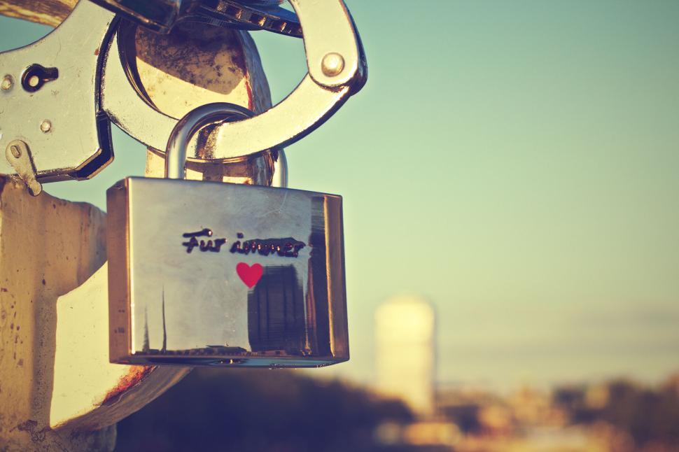 Free Image of Padlock with heart symbol on bridge 