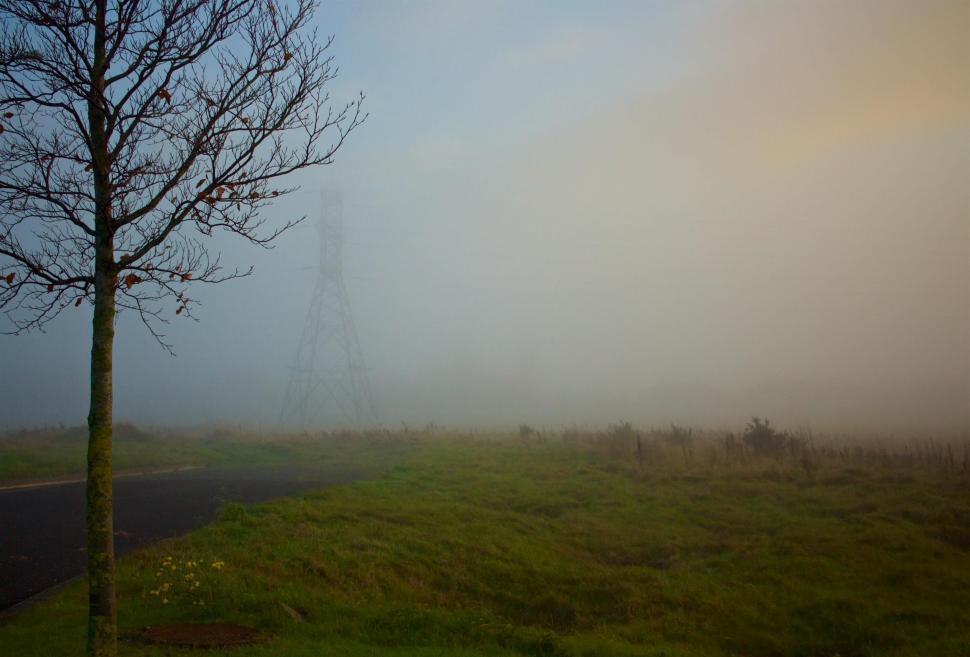 Free Image of Foggy morning with radio tower barely visible 
