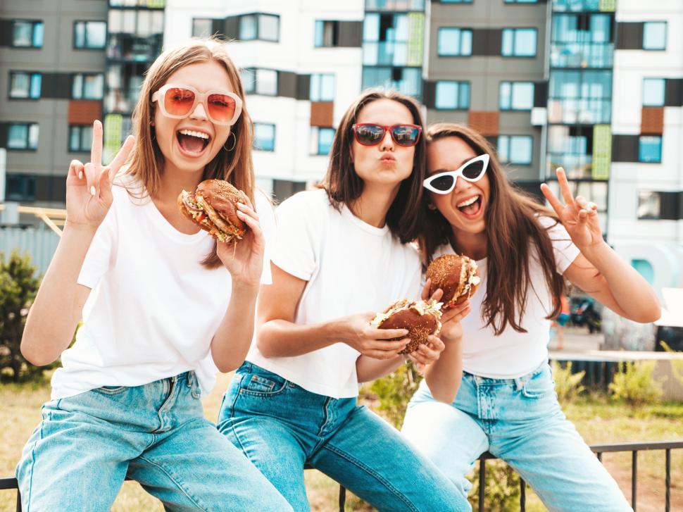 Free Image of A group of women posing for a picture 