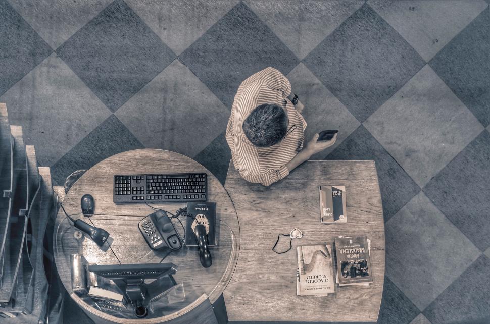 Free Image of Top-down view of a person using smartphone 