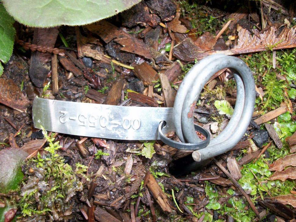 Free Image of Close Up of Metal Object on Ground 