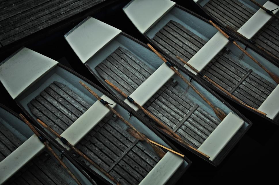Free Image of Aerial view of aligned rowboats 