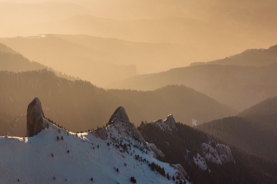 Free Image of Mountain landscape during a serene sunset 