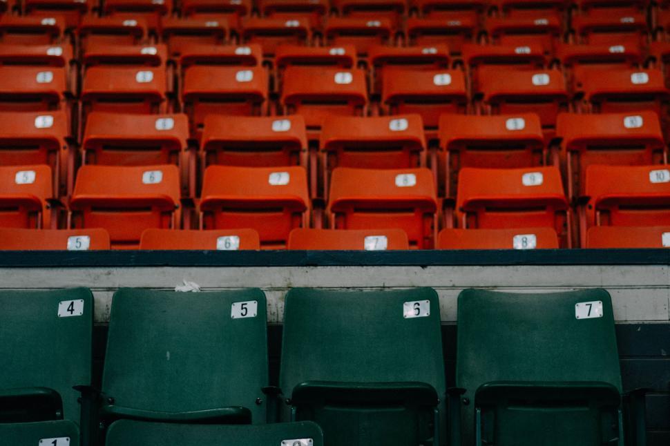Free Image of Empty stadium seats with numbering 