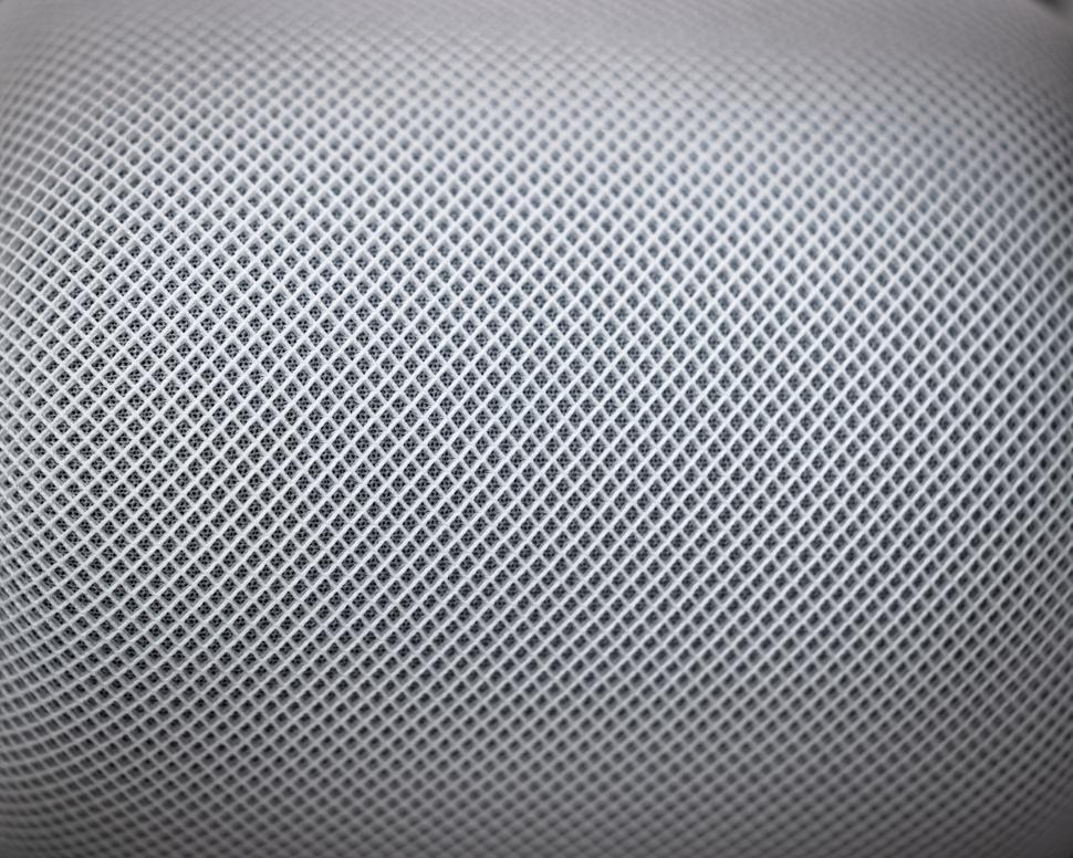 Free Image of Closeup of textured grey speaker grill 