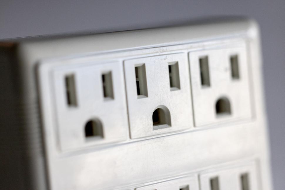 Free Image of Macro shot of a white power strip 