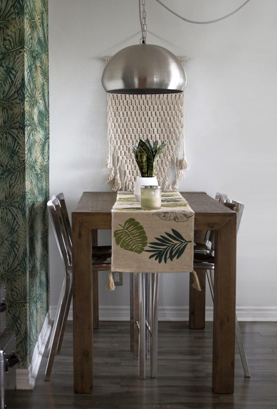 Free Image of Rustic dining table with elegant home decor 