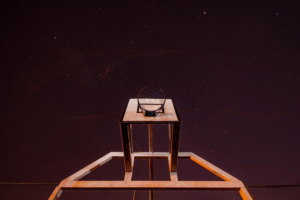 Free Image of Night basketball court under a starry sky 