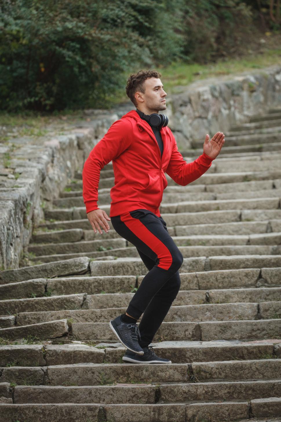 Free Image of Man running up the stairs 