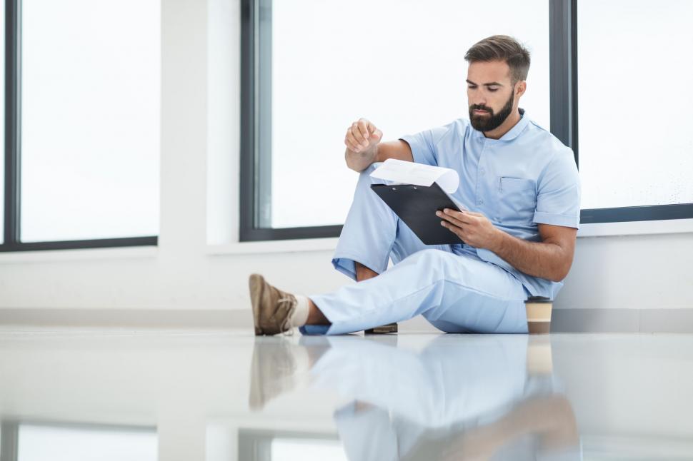 Free Image of Healthcare professional reviewing documents 