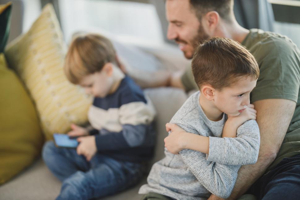 Free Image of Father and kids using technology at home 