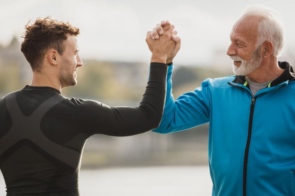 Free Image of Two athletes celebrating a successful workout 