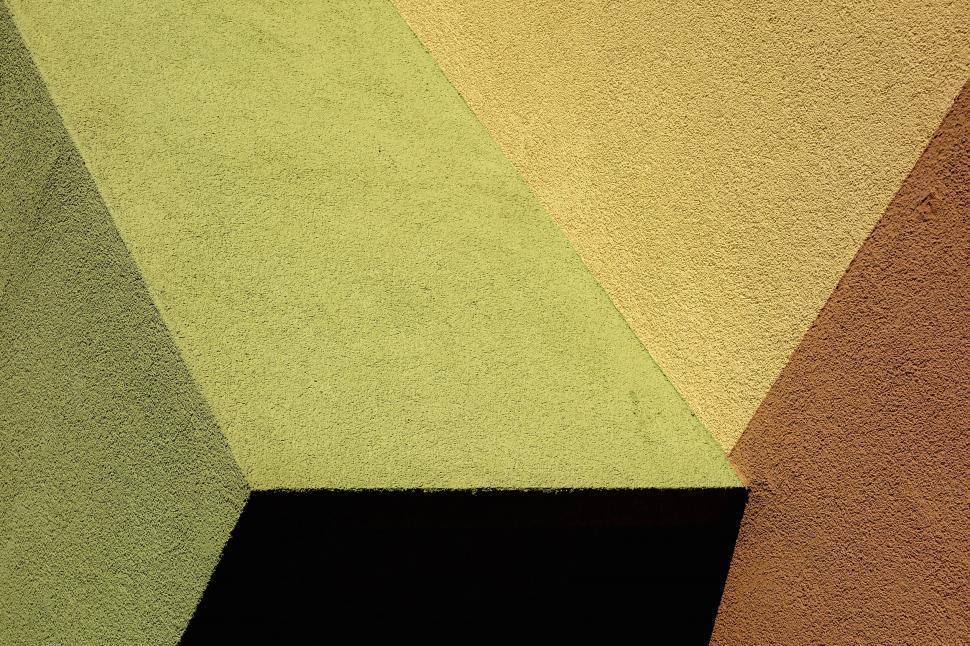 Free Image of Abstract geometric wall texture in green and yellow 