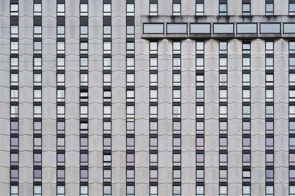 Free Image of Architectural pattern of windows on a building facade 