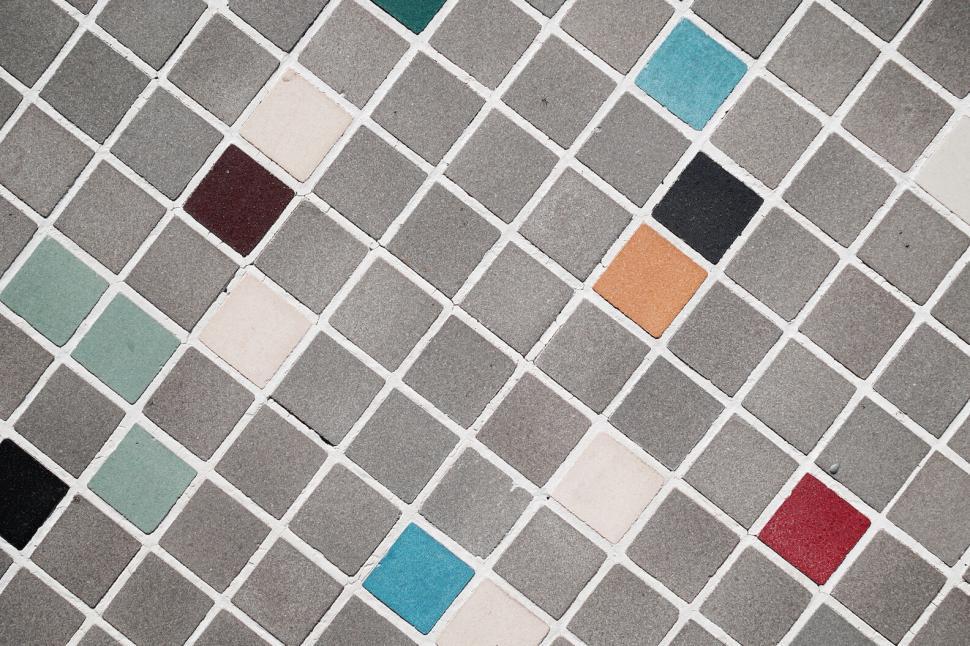 Free Image of Colorful tiles pattern on pavement 