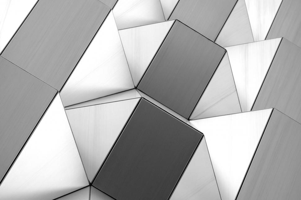 Free Image of Abstract pattern of metallic pyramid shapes 