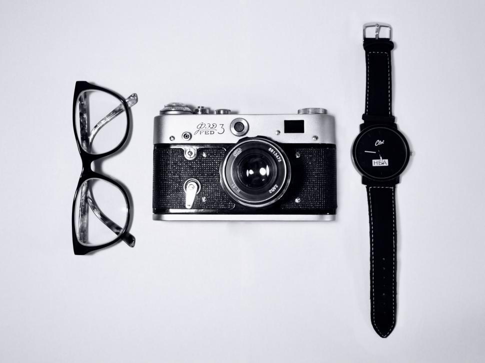 Free Image of Vintage camera and accessories on white 