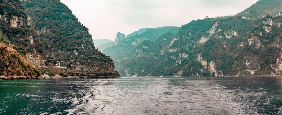 Free Image of Majestic river flowing between cliffs 