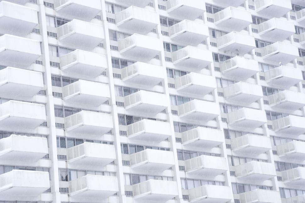 Free Image of Geometric pattern of a white apartment building 