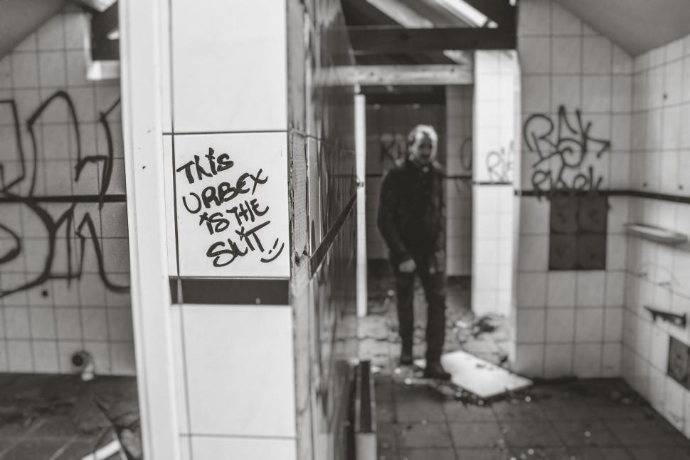 Free Image of Graffiti and blurred person in abandoned place 
