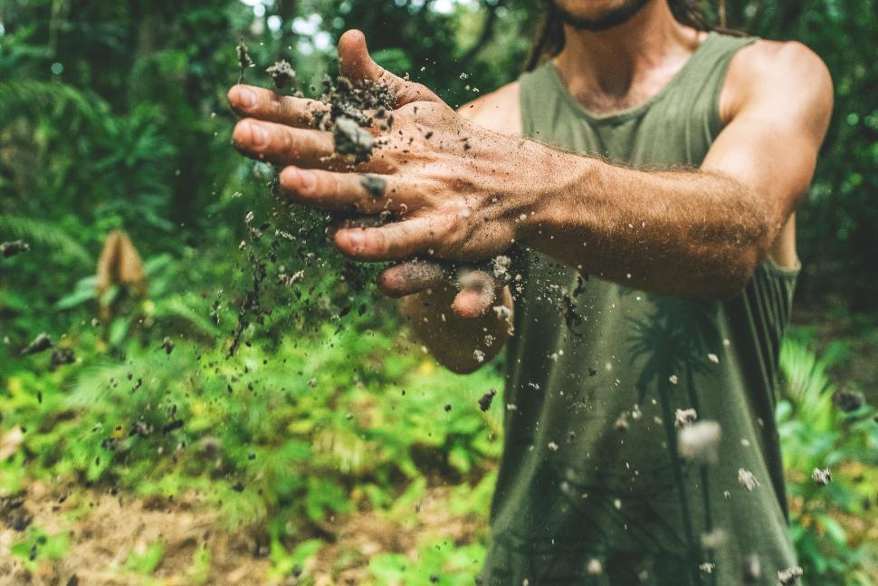 Free Image of Hands playing with soil nature connection concept 