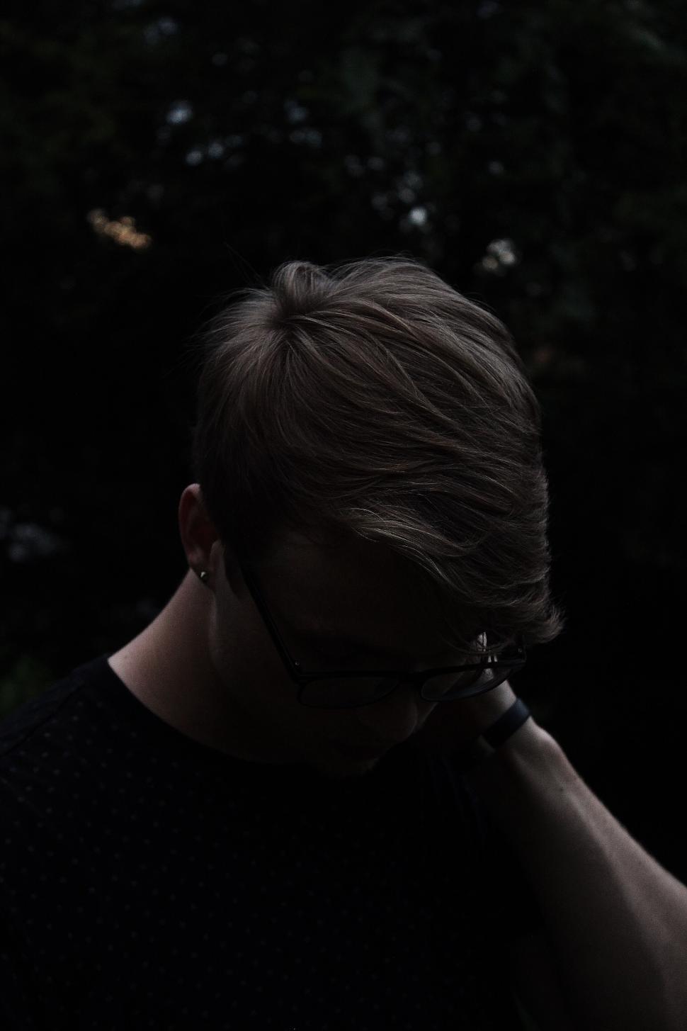 Free Image of Man with smartphone in soft focus 