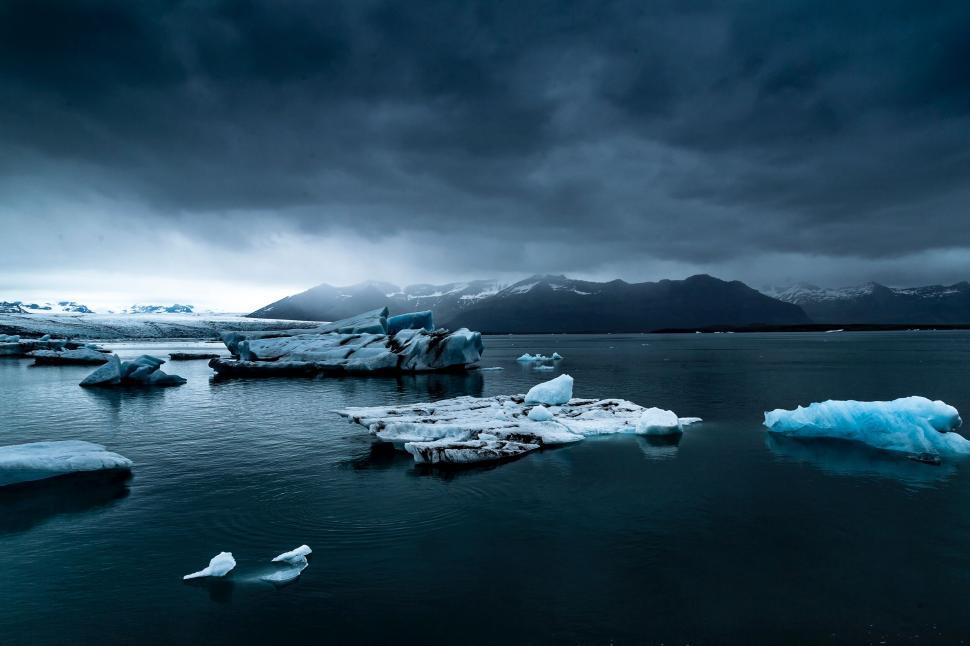 Free Image of Moody glacier lagoon with floating icebergs 