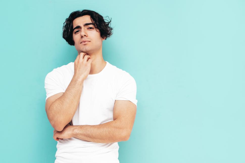 Free Image of A man in a white shirt 