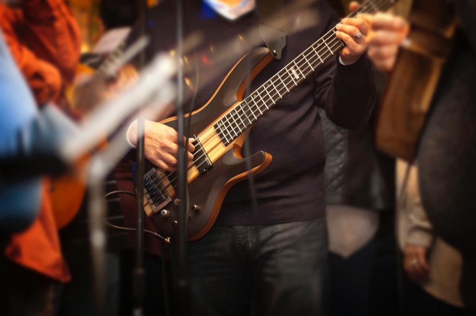 Free Image of Close-up of a musician playing the guitar 