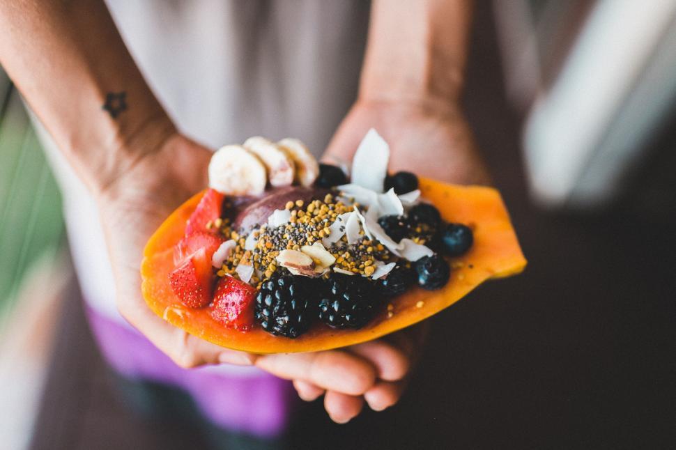 Free Image of Colorful fruit papaya boat in hands 