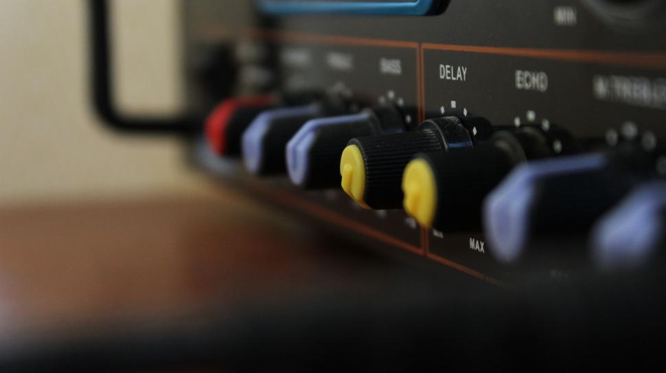Free Image of Close-up of sound mixing console sliders 