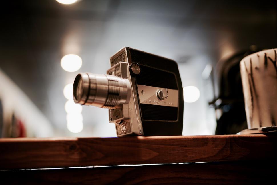 Free Image of Vintage camera on a wooden surface 