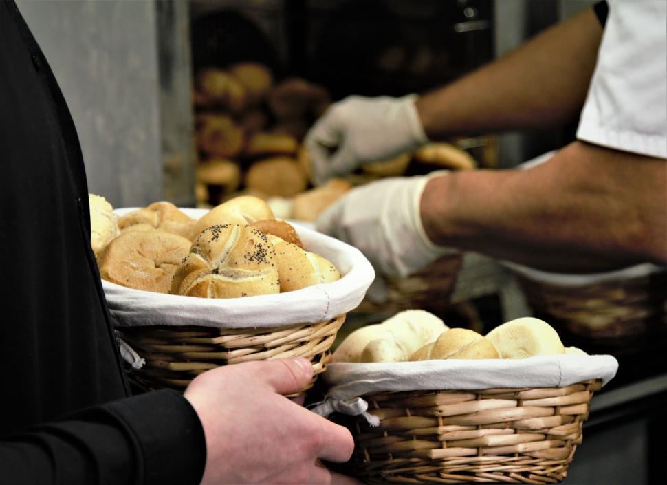 Free Image of Artisan bread in wicker baskets being served 