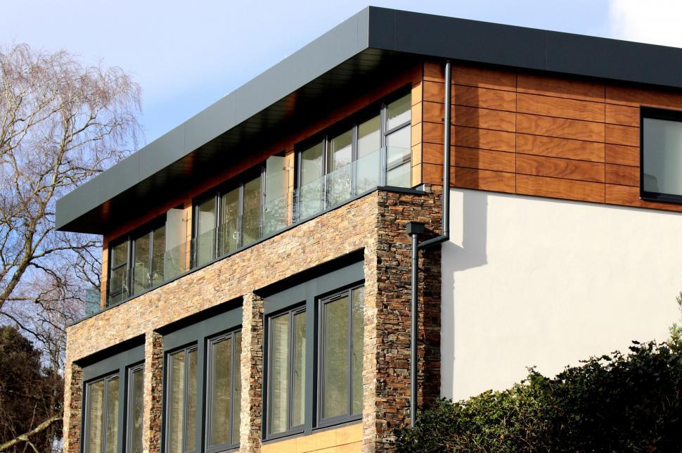 Free Image of Luxurious modern house with stone accents 