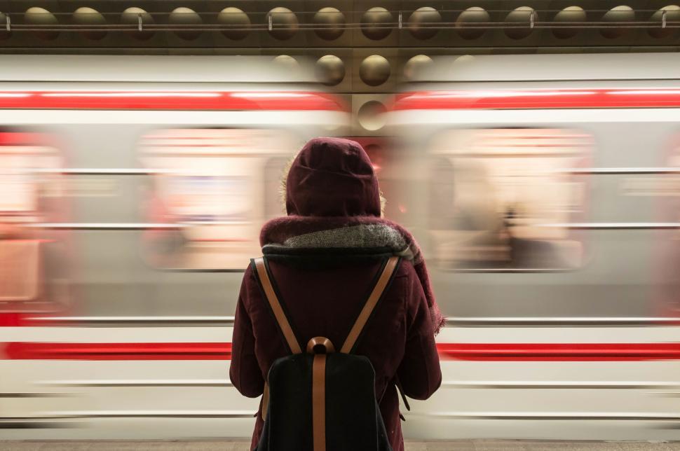 Free Image of Waiting at the subway station as train speeds by 